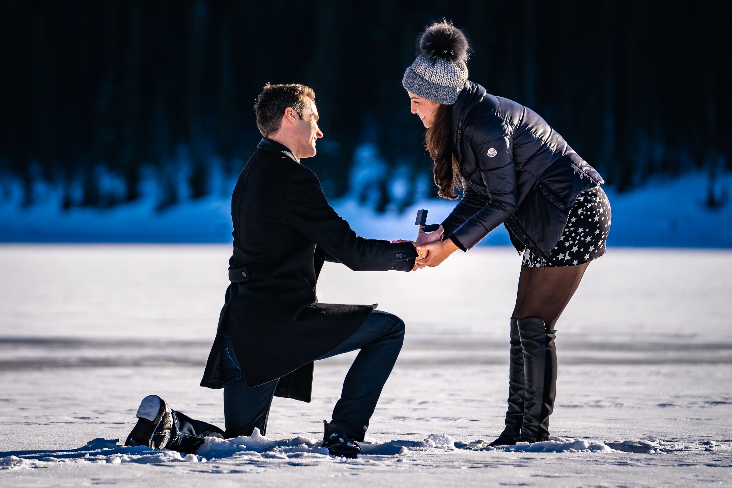 Man proposes to girlfriend while standing on a frozen lake with snowcapped mountains in the background, Engagement Session, Engagement Photos, Engagement Photos Inspiration, Engagement Photography, Engagement Photographer, Winter Engagement Photos, Proposal Photos, Proposal Photographer, Proposal Photography, Winter Proposal, Mountain Proposal, Proposal Inspiration, Summit County engagement session, Summit County engagement photos, Summit County engagement photography, Summit County engagement photographer, Summit County engagement inspiration, Colorado engagement session, Colorado engagement photos, Colorado engagement photography, Colorado engagement photographer, Colorado engagement inspiration, Clinton Gulch Engagement