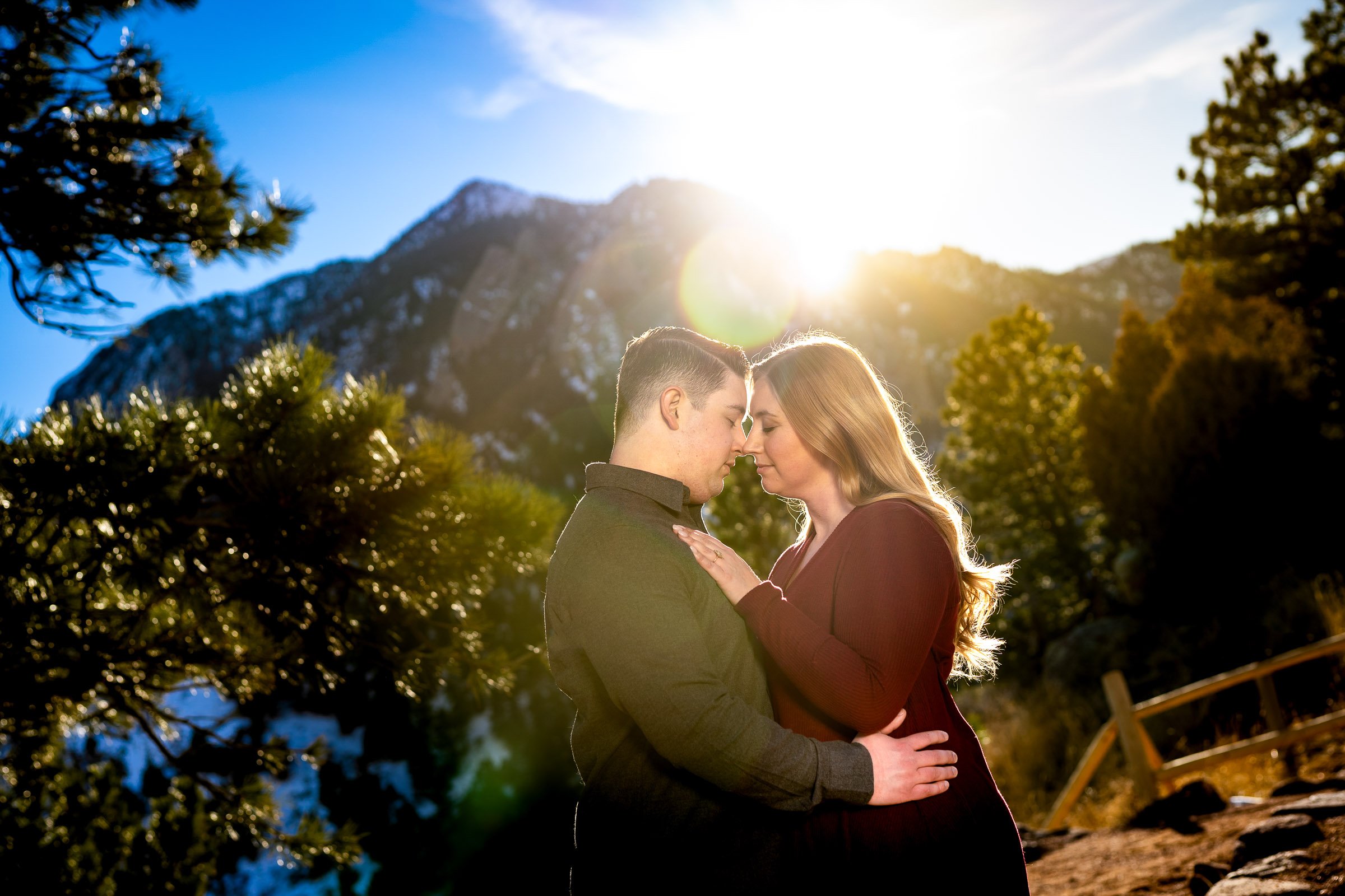 Engaged couple poses for portraits with the flatiron mountains in the background, Mountain Engagement Photos, Engagement Session, Engagement Photos, Engagement Photos Inspiration, Engagement Photography, Engagement Photographer, Engagement Portraits, Winter Engagement Photos, Snow Engagement Photos, Boulder engagement session, Boulder engagement photos, Boulder engagement photography, Boulder engagement photographer, Boulder engagement inspiration, NCAR Trail engagement session, NCAR Trail engagement photos, NCAR Trail engagement photography, NCAR Trail engagement photographer, NCAR Trail engagement inspiration, Colorado engagement session, Colorado engagement photos, Colorado engagement photography, Colorado engagement photographer, Colorado engagement inspiration, Flatiron Engagement Photos, Chautauqua Engagement Photos