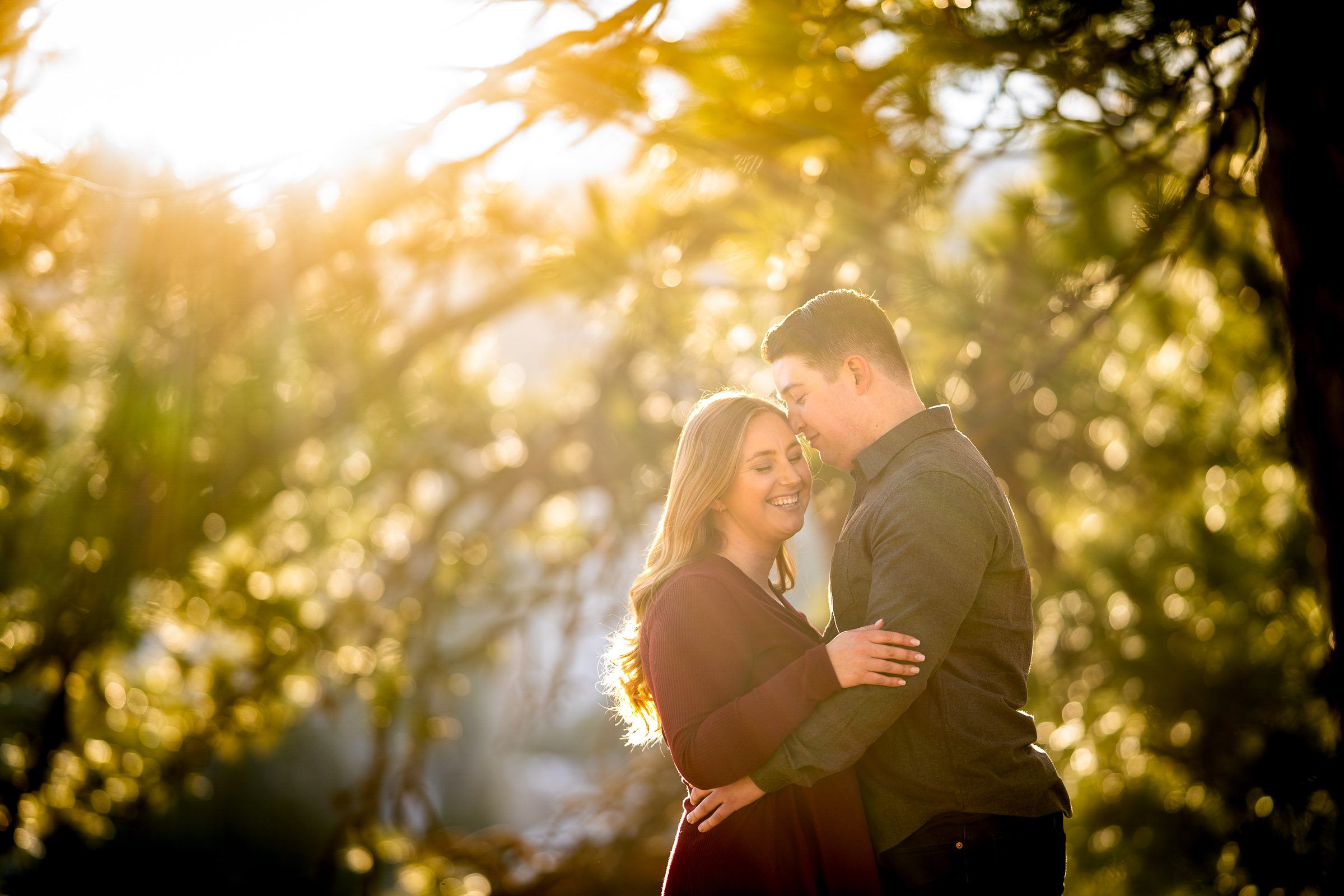 Engaged couple poses for portraits with the flatiron mountains in the background, Mountain Engagement Photos, Engagement Session, Engagement Photos, Engagement Photos Inspiration, Engagement Photography, Engagement Photographer, Engagement Portraits, Winter Engagement Photos, Snow Engagement Photos, Boulder engagement session, Boulder engagement photos, Boulder engagement photography, Boulder engagement photographer, Boulder engagement inspiration, NCAR Trail engagement session, NCAR Trail engagement photos, NCAR Trail engagement photography, NCAR Trail engagement photographer, NCAR Trail engagement inspiration, Colorado engagement session, Colorado engagement photos, Colorado engagement photography, Colorado engagement photographer, Colorado engagement inspiration, Flatiron Engagement Photos, Chautauqua Engagement Photos