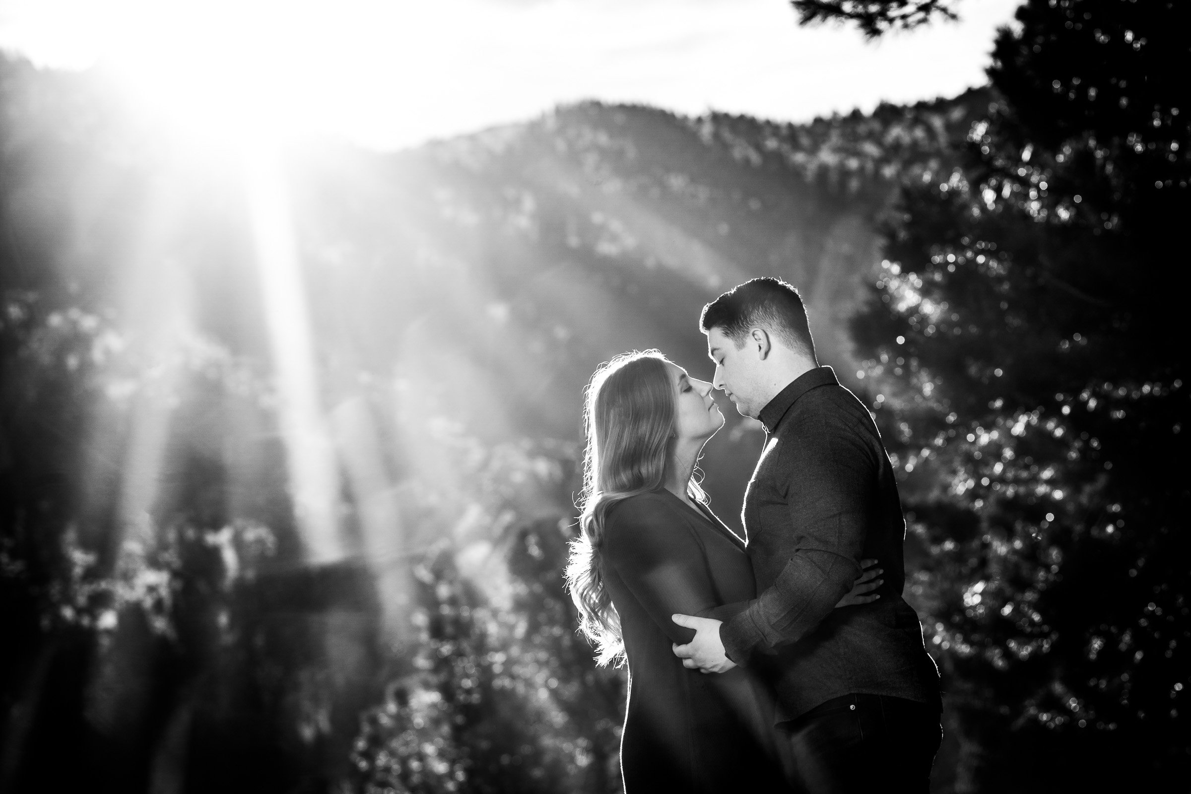 Engaged couple poses for portraits with the flatiron mountains in the background, Mountain Engagement Photos, Engagement Session, Engagement Photos, Engagement Photos Inspiration, Engagement Photography, Engagement Photographer, Engagement Portraits, Winter Engagement Photos, Snow Engagement Photos, Boulder engagement session, Boulder engagement photos, Boulder engagement photography, Boulder engagement photographer, Boulder engagement inspiration, NCAR Trail engagement session, NCAR Trail engagement photos, NCAR Trail engagement photography, NCAR Trail engagement photographer, NCAR Trail engagement inspiration, Colorado engagement session, Colorado engagement photos, Colorado engagement photography, Colorado engagement photographer, Colorado engagement inspiration, Flatiron Engagement Photos, Chautauqua Engagement Photos