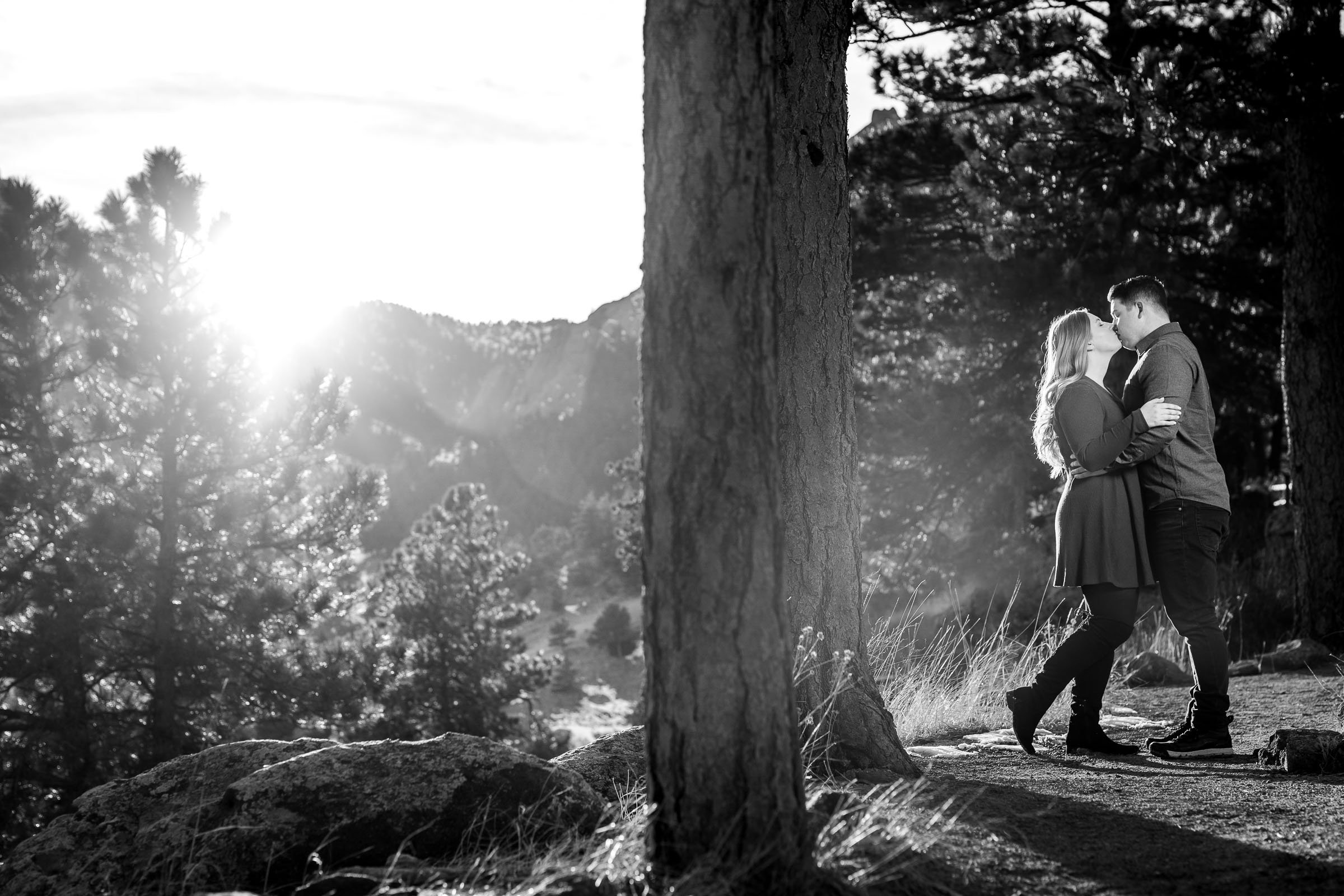 Engaged couple poses for portraits with the flatiron mountains in the background, Mountain Engagement Photos, Engagement Session, Engagement Photos, Engagement Photos Inspiration, Engagement Photography, Engagement Photographer, Engagement Portraits, Winter Engagement Photos, Snow Engagement Photos, Boulder engagement session, Boulder engagement photos, Boulder engagement photography, Boulder engagement photographer, Boulder engagement inspiration, NCAR Trail engagement session, NCAR Trail engagement photos, NCAR Trail engagement photography, NCAR Trail engagement photographer, NCAR Trail engagement inspiration, Colorado engagement session, Colorado engagement photos, Colorado engagement photography, Colorado engagement photographer, Colorado engagement inspiration, Flatiron Engagement Photos, Chautauqua Engagement Photos