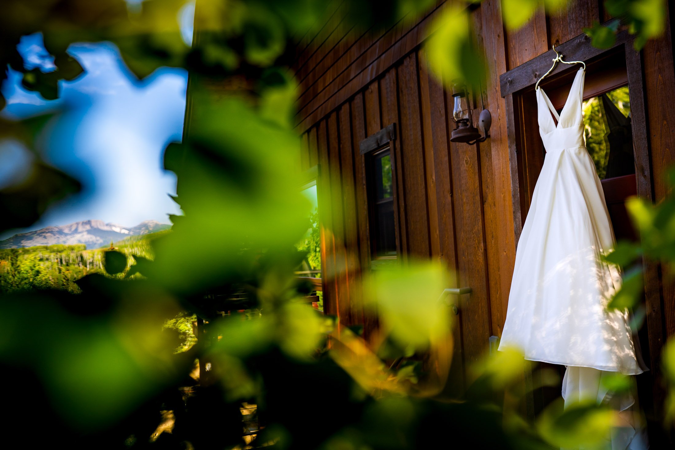 Wedding gown detail at family's cabin in the mountains, wedding, wedding photos, wedding photography, wedding photographer, wedding inspiration, wedding photo inspiration, wedding portraits, wedding ceremony, wedding reception, mountain wedding, Catholic Church wedding, Catholic Church wedding photos, Catholic Church wedding photography, Catholic Church wedding photographer, Catholic Church wedding inspiration, Catholic Church wedding venue, Steamboat Springs wedding, Steamboat Springs wedding photos, Steamboat Springs wedding photography, Steamboat Springs wedding photographer, Colorado wedding, Colorado wedding photos, Colorado wedding photography, Colorado wedding photographer, Colorado mountain wedding, Colorado wedding inspiration