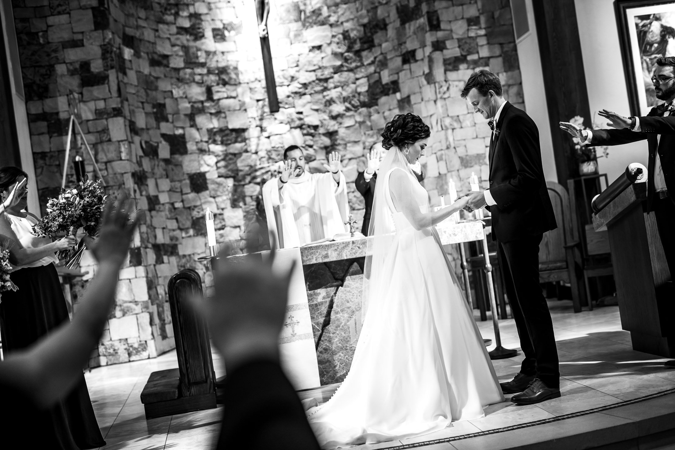 Bride and groom attend their catholic wedding ceremony at the church, wedding, wedding photos, wedding photography, wedding photographer, wedding inspiration, wedding photo inspiration, wedding portraits, wedding ceremony, wedding reception, mountain wedding, Catholic Church wedding, Catholic Church wedding photos, Catholic Church wedding photography, Catholic Church wedding photographer, Catholic Church wedding inspiration, Catholic Church wedding venue, Steamboat Springs wedding, Steamboat Springs wedding photos, Steamboat Springs wedding photography, Steamboat Springs wedding photographer, Colorado wedding, Colorado wedding photos, Colorado wedding photography, Colorado wedding photographer, Colorado mountain wedding, Colorado wedding inspiration