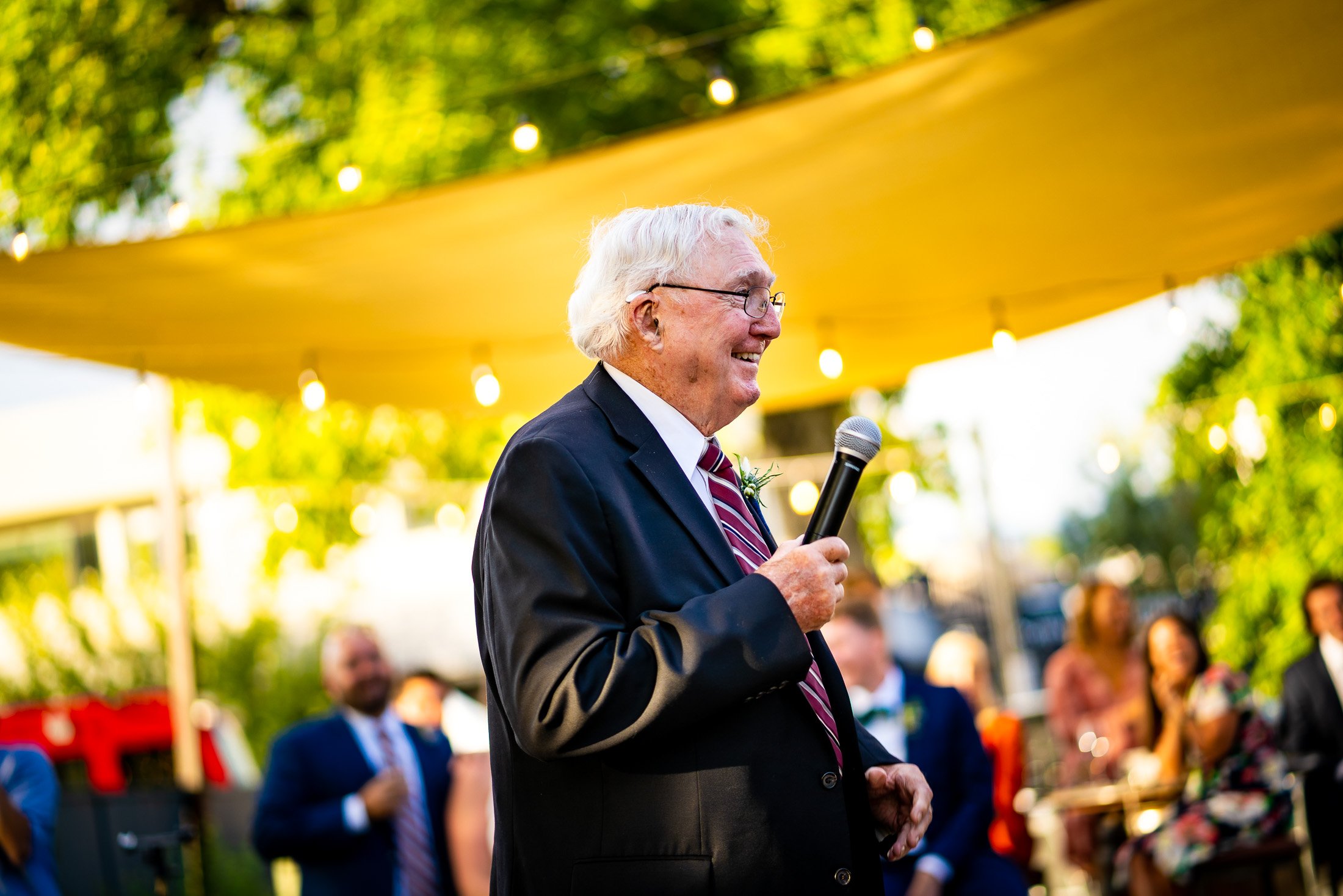 Guests react to speeches during the wedding reception, wedding, wedding photos, wedding photography, wedding photographer, wedding inspiration, wedding photo inspiration, wedding portraits, wedding ceremony, wedding reception, mountain wedding, Catholic Church wedding, Catholic Church wedding photos, Catholic Church wedding photography, Catholic Church wedding photographer, Catholic Church wedding inspiration, Catholic Church wedding venue, Steamboat Springs wedding, Steamboat Springs wedding photos, Steamboat Springs wedding photography, Steamboat Springs wedding photographer, Colorado wedding, Colorado wedding photos, Colorado wedding photography, Colorado wedding photographer, Colorado mountain wedding, Colorado wedding inspiration